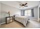 Cozy bedroom featuring a double bed, nightstand, and ceiling fan at 100 Sea Island Blvd, Fort Mill, SC 29708