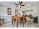 Bright dining room with hardwood floors, wooden table and chairs, and art at 100 Sea Island Blvd, Fort Mill, SC 29708