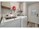 Bright laundry room with washer, dryer, and ample storage at 100 Sea Island Blvd, Fort Mill, SC 29708