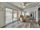 Living area with sliding glass doors to backyard and view of kitchen at 100 Sea Island Blvd, Fort Mill, SC 29708