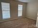 Bedroom with neutral walls and carpet flooring at 1004 Rosewater Ln, Indian Trail, NC 28079