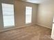 Spacious bedroom with neutral walls and carpeting at 1004 Rosewater Ln, Indian Trail, NC 28079