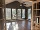 Sunroom with many windows and hardwood floors at 1004 Rosewater Ln, Indian Trail, NC 28079