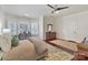 Bright bedroom with bay window, a sitting area, and hardwood floor at 10718 Lederer Ave, Charlotte, NC 28277