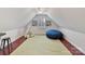 Bonus room with hardwood floors, a teepee, and a beanbag chair at 10718 Lederer Ave, Charlotte, NC 28277