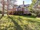 Brick house with large deck and backyard at 10718 Lederer Ave, Charlotte, NC 28277