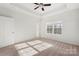 Spacious bedroom with neutral decor and carpeted floors at 11043 Lawyers Rd, Mint Hill, NC 28227