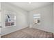 Spacious bedroom with neutral walls and carpet at 11043 Lawyers Rd, Mint Hill, NC 28227