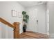 Bright and airy entryway with hardwood floors and staircase at 11043 Lawyers Rd # 32, Mint Hill, NC 28227