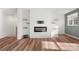 Modern electric fireplace with built-in shelving at 11043 Lawyers Rd # 32, Mint Hill, NC 28227