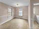 Bright dining room with tile flooring and neutral walls at 1107 Phifer Rd, Kings Mountain, NC 28086