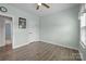 Bedroom features wood floors and a ceiling fan at 1112 Augustus Beamon Dr, Indian Trail, NC 28079