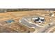 Aerial view of community amenities that include a pool, tennis courts, clubhouse and parking at 1112 Augustus Beamon Dr, Indian Trail, NC 28079