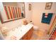 Clean bathroom with colorful shower curtain and vanity at 11646 Rabbit Ridge Rd, Charlotte, NC 28270