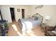 Bright bedroom with a bed and access to a closet and bathroom at 11646 Rabbit Ridge Rd, Charlotte, NC 28270