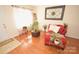 Bright living room featuring hardwood floors and comfy seating at 11646 Rabbit Ridge Rd, Charlotte, NC 28270