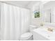 Clean bathroom with white vanity and updated fixtures at 11816 Park Rd, Charlotte, NC 28226