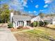 Ranch home with driveway and landscaped yard at 11816 Park Rd, Charlotte, NC 28226