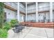 Brick courtyard with metal tables and chairs at 119 S Lee St, Salisbury, NC 28144