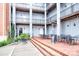 Brick courtyard with metal tables and chairs at 119 S Lee St, Salisbury, NC 28144