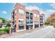 Three-story brick building with retail space on the ground floor at 119 S Lee St, Salisbury, NC 28144