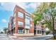 Brick building with multiple units and street-level retail spaces at 119 S Lee St, Salisbury, NC 28144