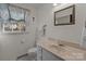 Clean bathroom with single sink vanity and shower/tub combo at 1212 Ridge St, Albemarle, NC 28001