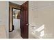 Simple bathroom with a tub and access to another room at 1212 Ridge St, Albemarle, NC 28001