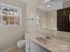 Clean bathroom with a single sink vanity and tub shower combo at 1212 Ridge St, Albemarle, NC 28001