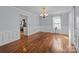 Bright dining room with hardwood floors and wainscoting at 1212 Ridge St, Albemarle, NC 28001