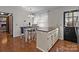 Eat-in kitchen with island and black exterior door at 1212 Ridge St, Albemarle, NC 28001