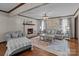 Living room with fireplace and hardwood floors at 1212 Ridge St, Albemarle, NC 28001