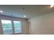This carpeted bedroom features natural light from a double window at 12131 Plummer Ct # 1, Midland, NC 28107