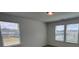 Comfortable bedroom featuring two windows with blinds, offering a bright and inviting space at 12131 Plummer Ct # 1, Midland, NC 28107