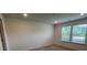This carpeted bedroom features natural light from a double window at 12131 Plummer Ct # 1, Midland, NC 28107