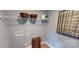 Bright laundry room with shelving and stylish baskets at 12131 Plummer Ct # 1, Midland, NC 28107