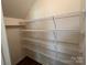 Walk-in closet featuring shelves for storage at 12131 Plummer Ct # 1, Midland, NC 28107