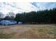 Large backyard with detached garage at 1270 Mirror Lake Rd, Lincolnton, NC 28092