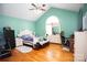 Large bedroom with hardwood floors, high ceilings, and built-in workspace at 1270 Mirror Lake Rd, Lincolnton, NC 28092