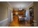 Dining room with hardwood floors and access to kitchen at 1270 Mirror Lake Rd, Lincolnton, NC 28092