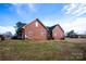 Brick house exterior with screened porch at 1270 Mirror Lake Rd, Lincolnton, NC 28092