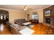 Bright living room with hardwood floors, fireplace, and ample natural light at 1270 Mirror Lake Rd, Lincolnton, NC 28092