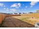 Fenced backyard with grassy area and patio at 128 Mooring Dr, Statesville, NC 28677