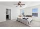 Main bedroom with ensuite bathroom and ceiling fan at 128 Mooring Dr, Statesville, NC 28677