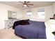 Main bedroom with large bed and dresser; great natural light at 131 Crownpiece St, Troutman, NC 28166