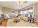 Bright living room with large windows and a plush white couch at 1486 Amity Church Rd, Denver, NC 28037