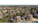 Aerial view of house and neighborhood with trees at 15409 Brem Ln, Charlotte, NC 28277