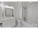 Elegant bathroom with a shower/tub combo and marble tile at 15409 Brem Ln, Charlotte, NC 28277