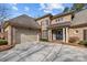 Two-car garage with light beige doors at 15409 Brem Ln, Charlotte, NC 28277