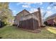 Brick house with deck and landscaped yard at 15409 Brem Ln, Charlotte, NC 28277